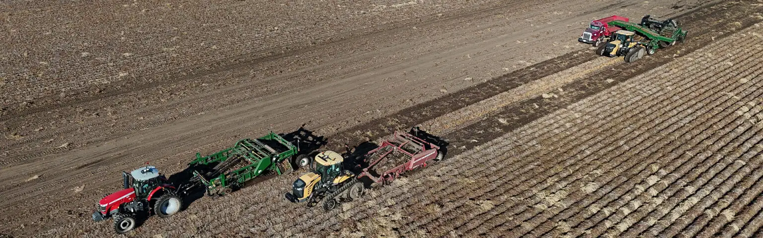 Several tractors working the field